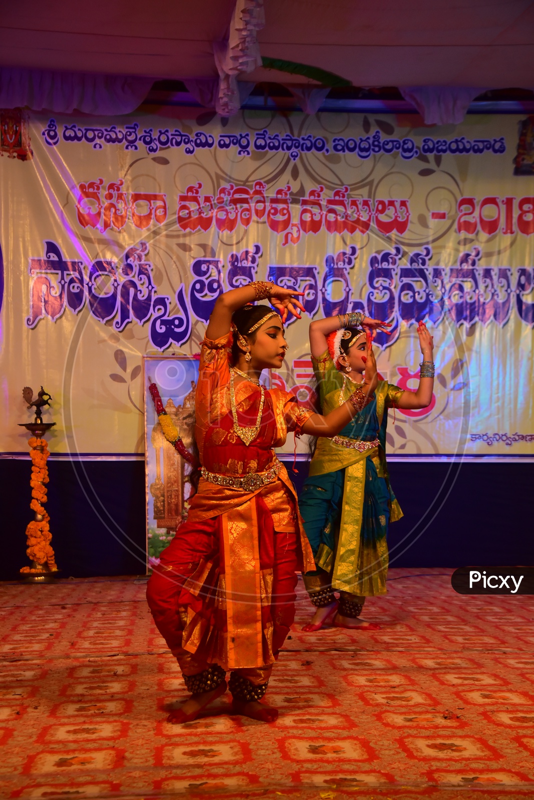 Artists performing Indian Classical Dance Kuchipudi on Stage