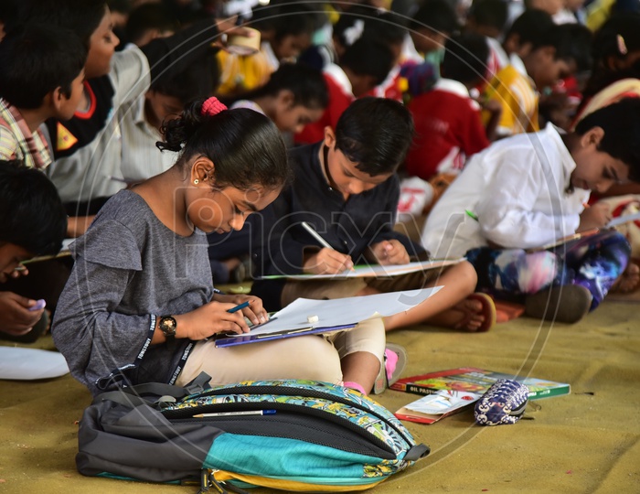 School kids during a drawing competition