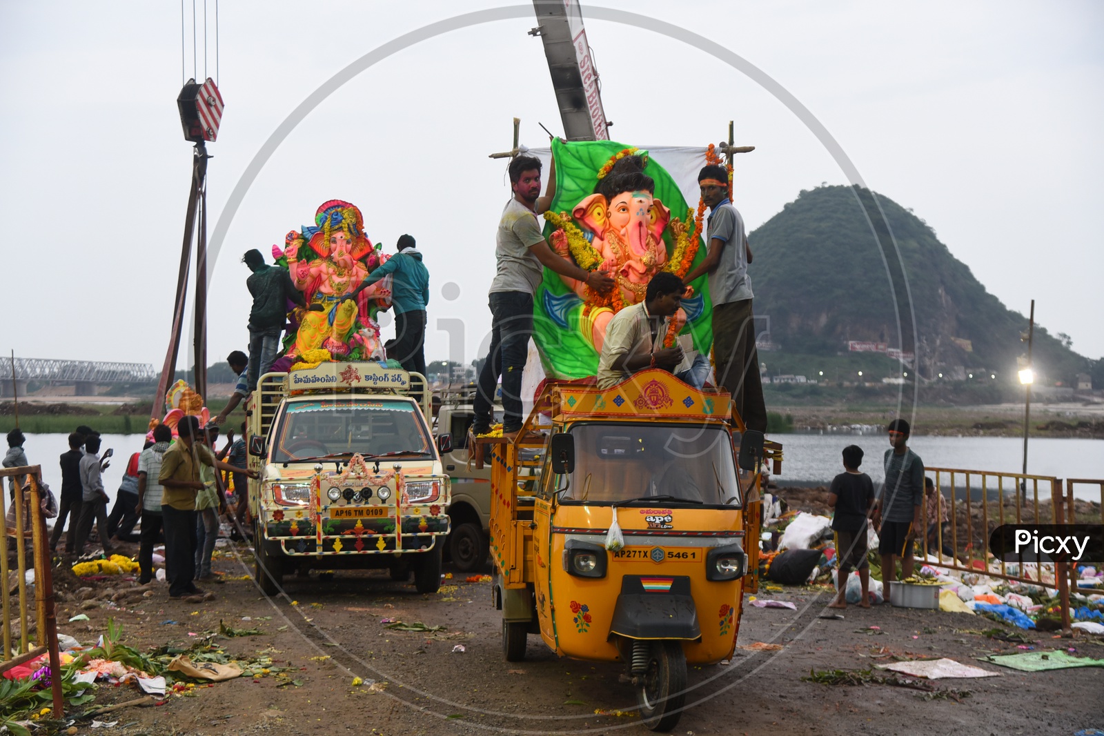 Ganesha Idols being carried on the trolley auto during Ganesh Visarjan