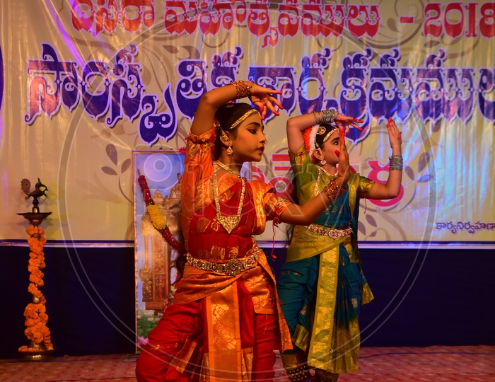 Artists performing Indian Classical Dance Kuchipudi on Stage