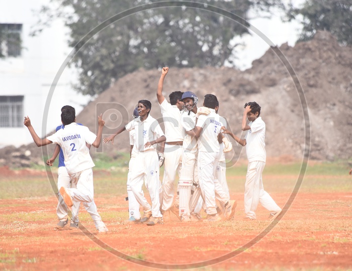 School kids celebrating victory  during cricket match