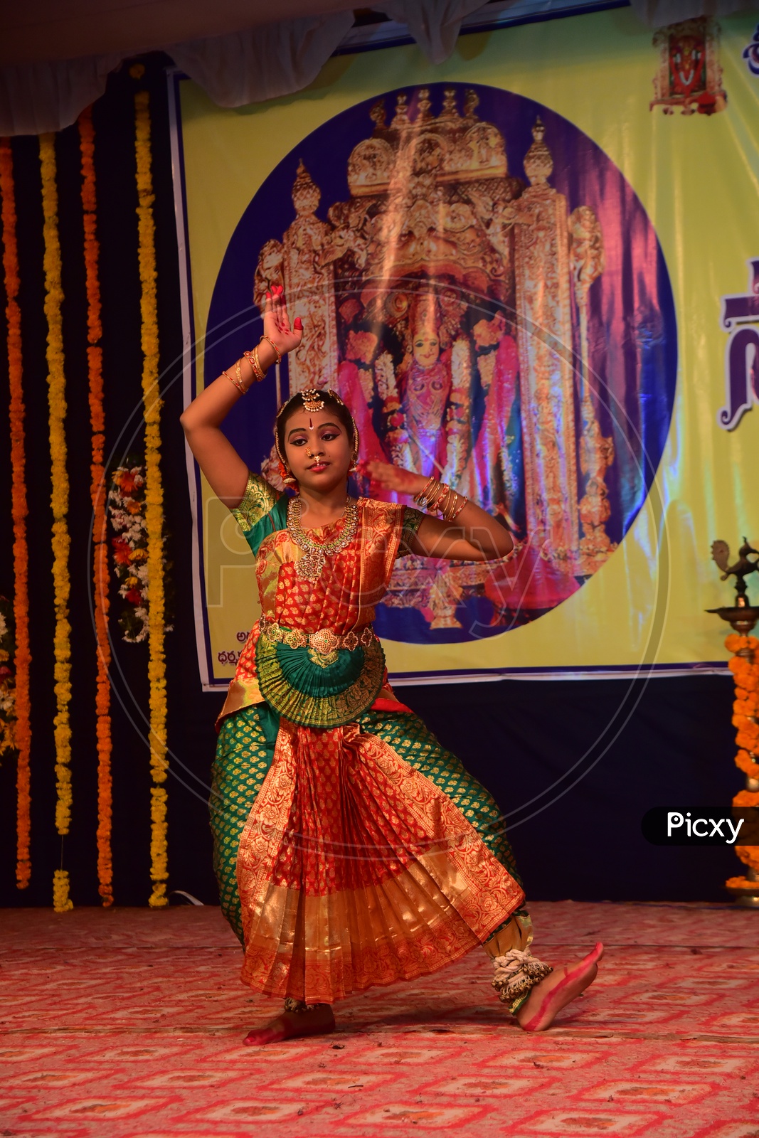 Artist performing Indian Classical Dance Kuchipudi on Stage