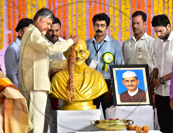 AP Chief Minister Chandra Babu Naidu garlanding the Gandhi Statue