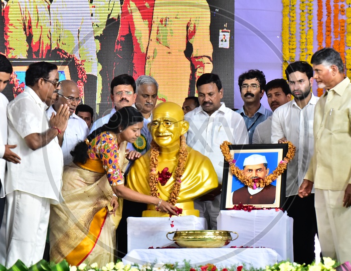 Public Representatives garlanding the Gandhi Statue during the launch of Swachh Andhra Mission