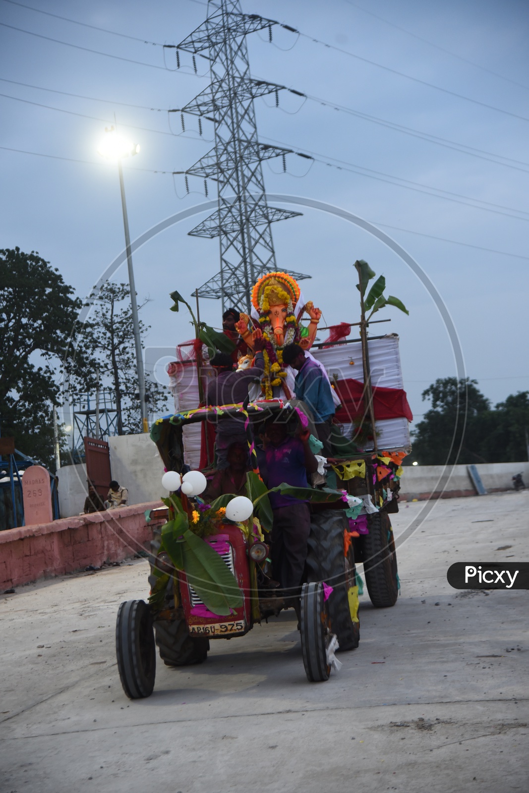 Ganesha Idol being carried on the tractor