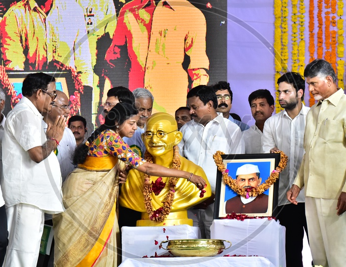 Public Representatives garlanding the statues during the launch of Swachh Andhra Mission