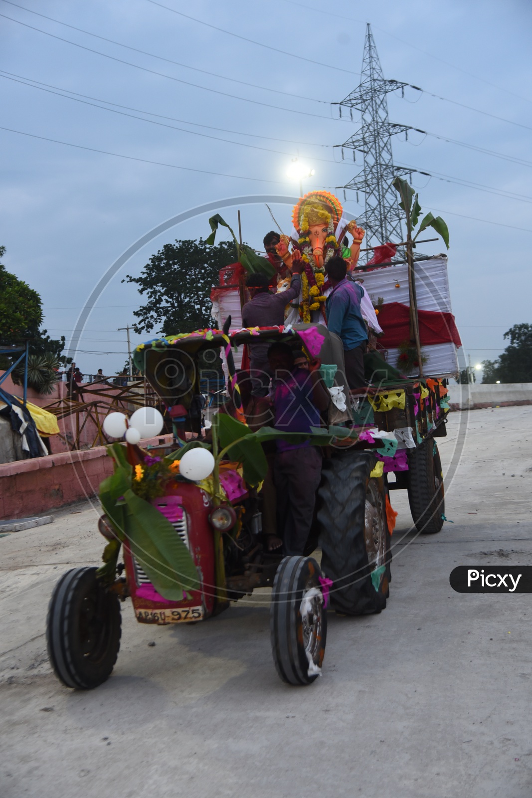 Ganesha Idol being carried on the tractor