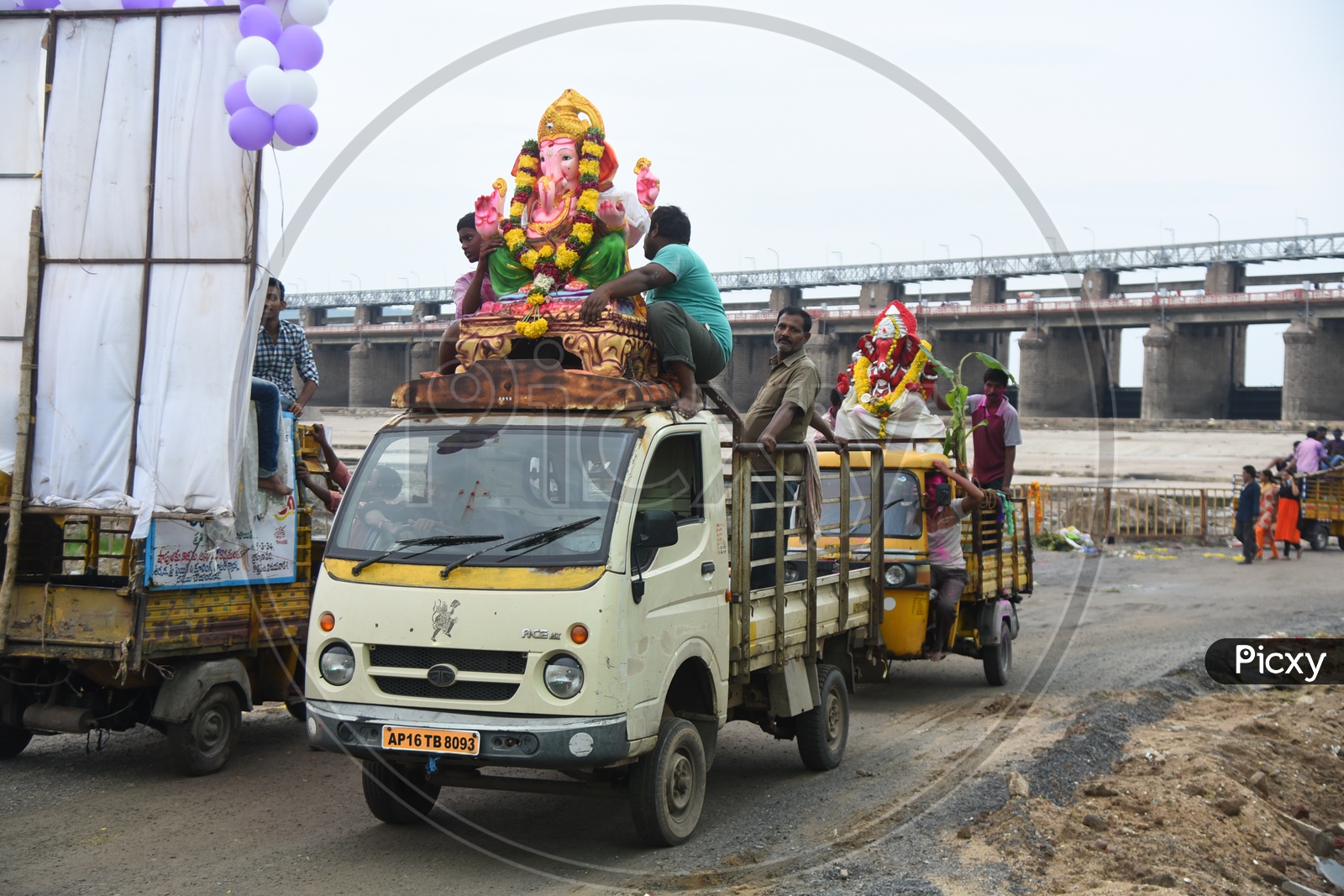 Ganesha Idols being carried on the trolley auto during Ganesh Visarjan