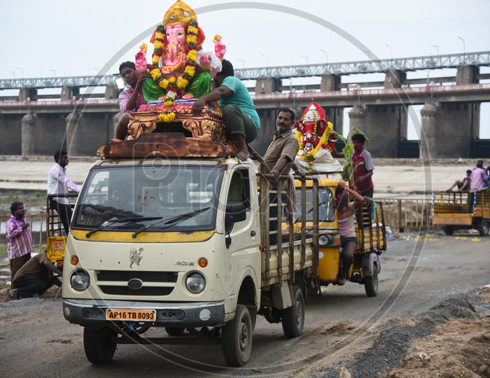Ganesha Idols on the trolley autos during Ganesh Visarjan