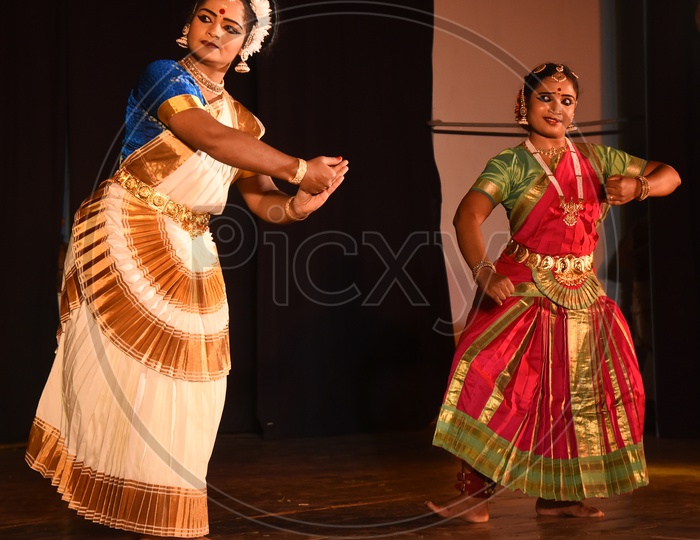 Artists performing Indian Classical Dance Kuchipudi on stage