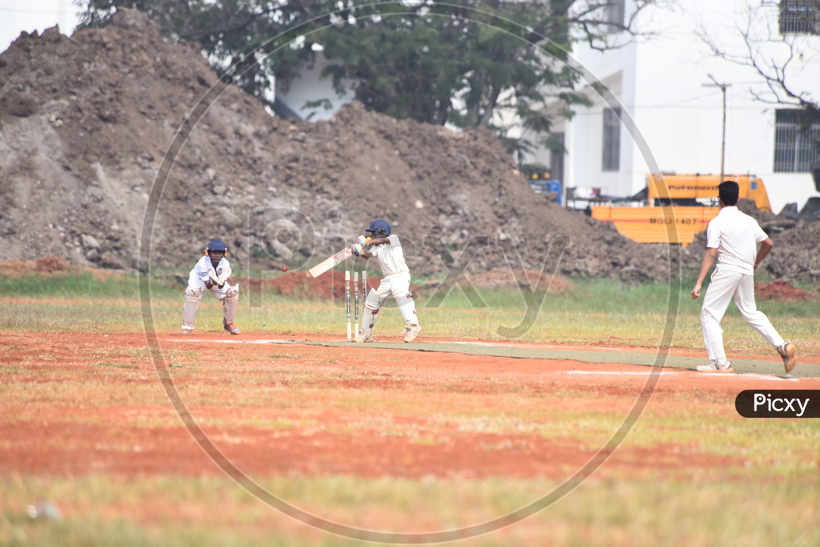 School Kids playing cricket