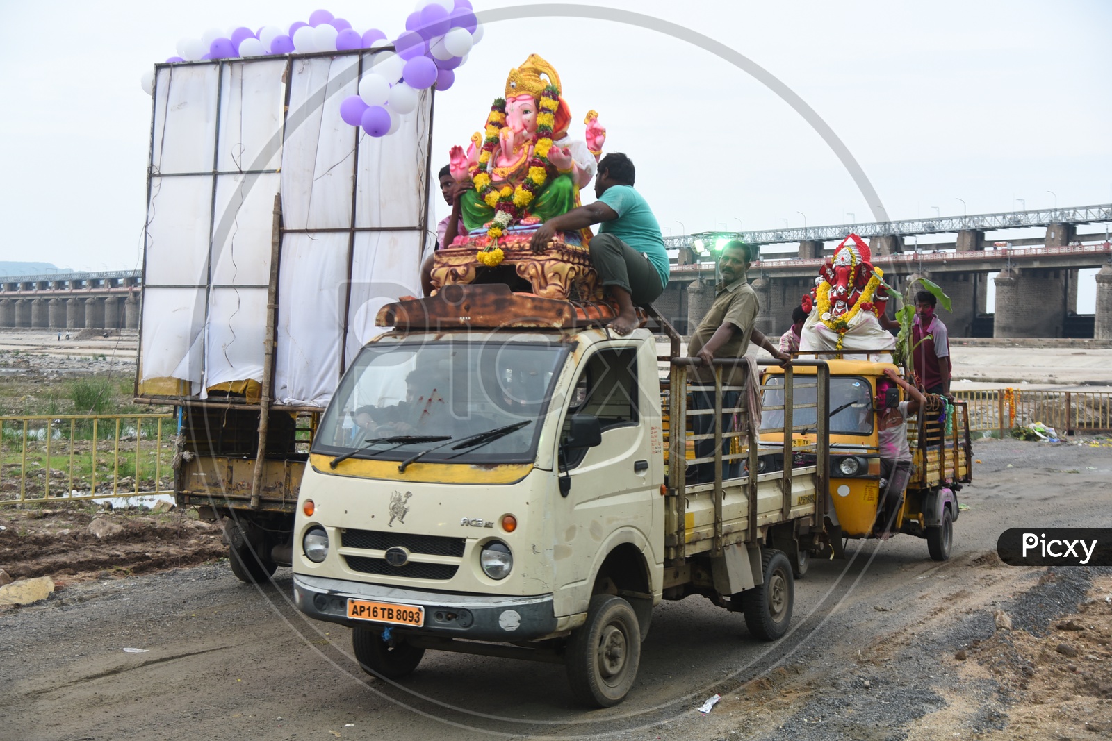 Ganesha Idols on the trolley autos during Ganesh Visarjan