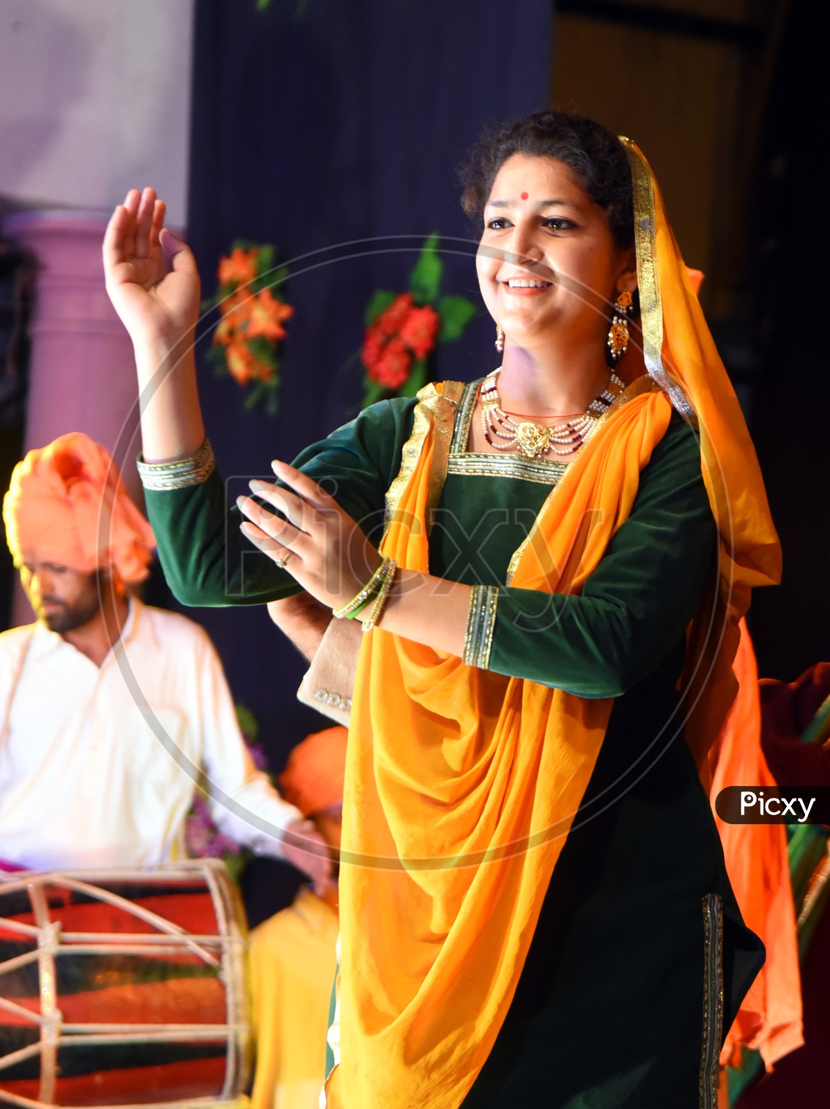 Artists performing Rouf Dance on stage
