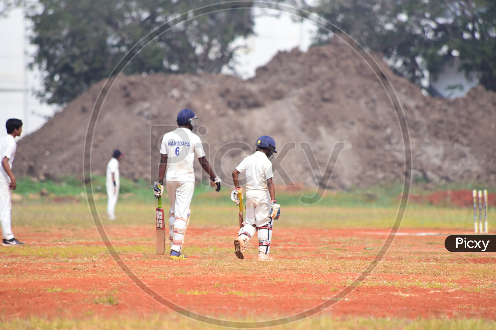 School Kids playing cricket