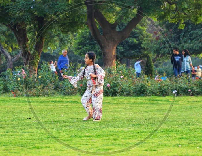 A girl playing in the park