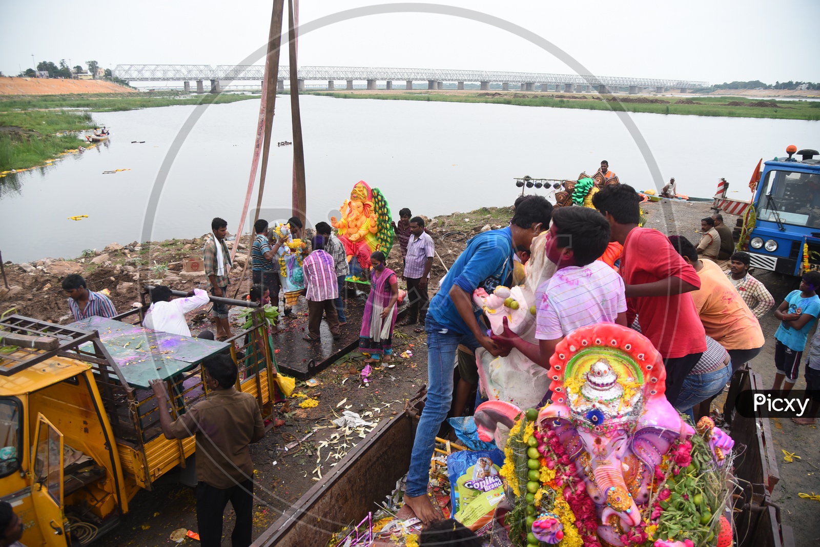 People with Ganesha Idols during the visarjan