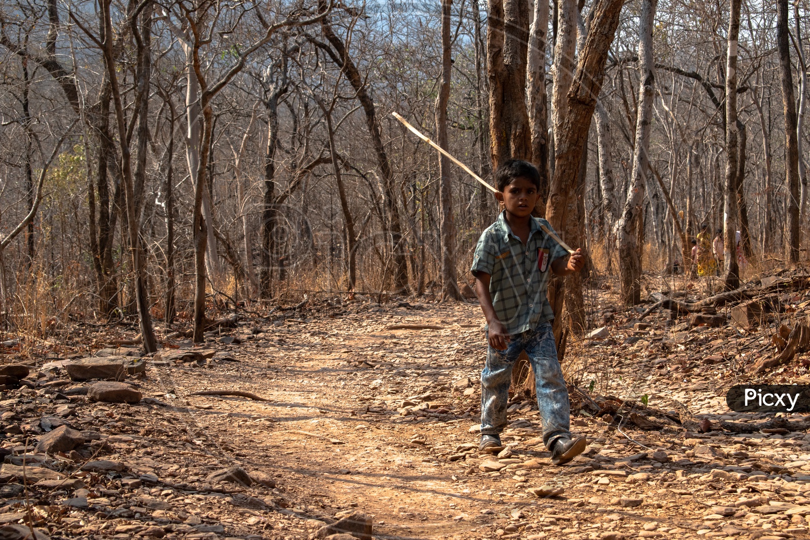 KID WALKING THROUGH THE HILL ROADS OF PAVANA NARASIMHA SWAMI TEMPLE, AHOBILAM.