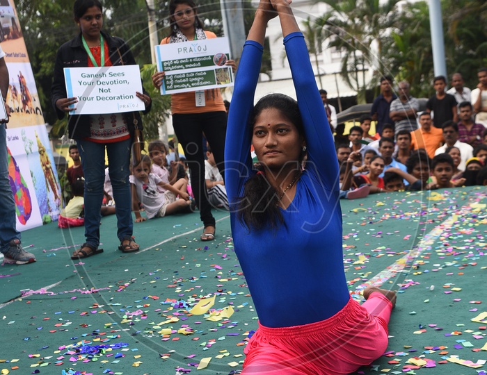 A Young School Girl Performing Yoga Aasanas  on Stage