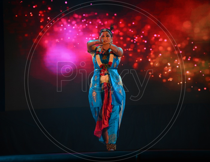 Artists In Sri Krishna Attire  Performing  Dance On Stage