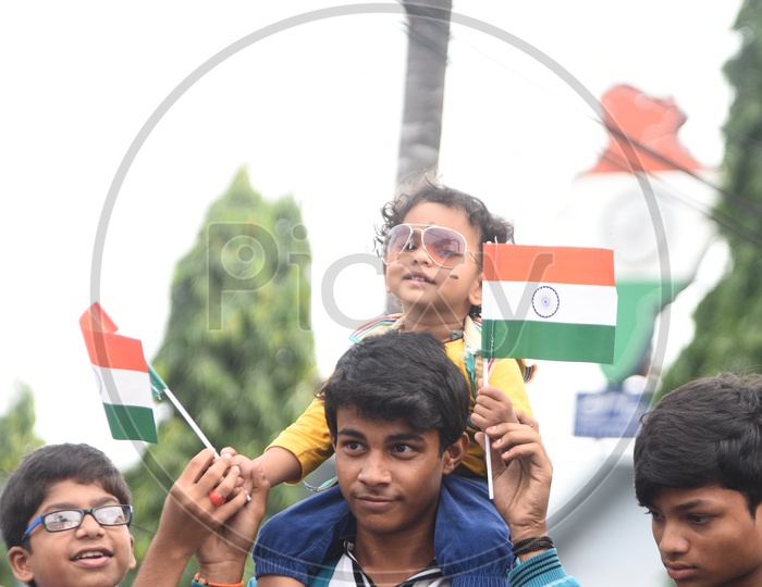 Young School Kid With Indian National Flag