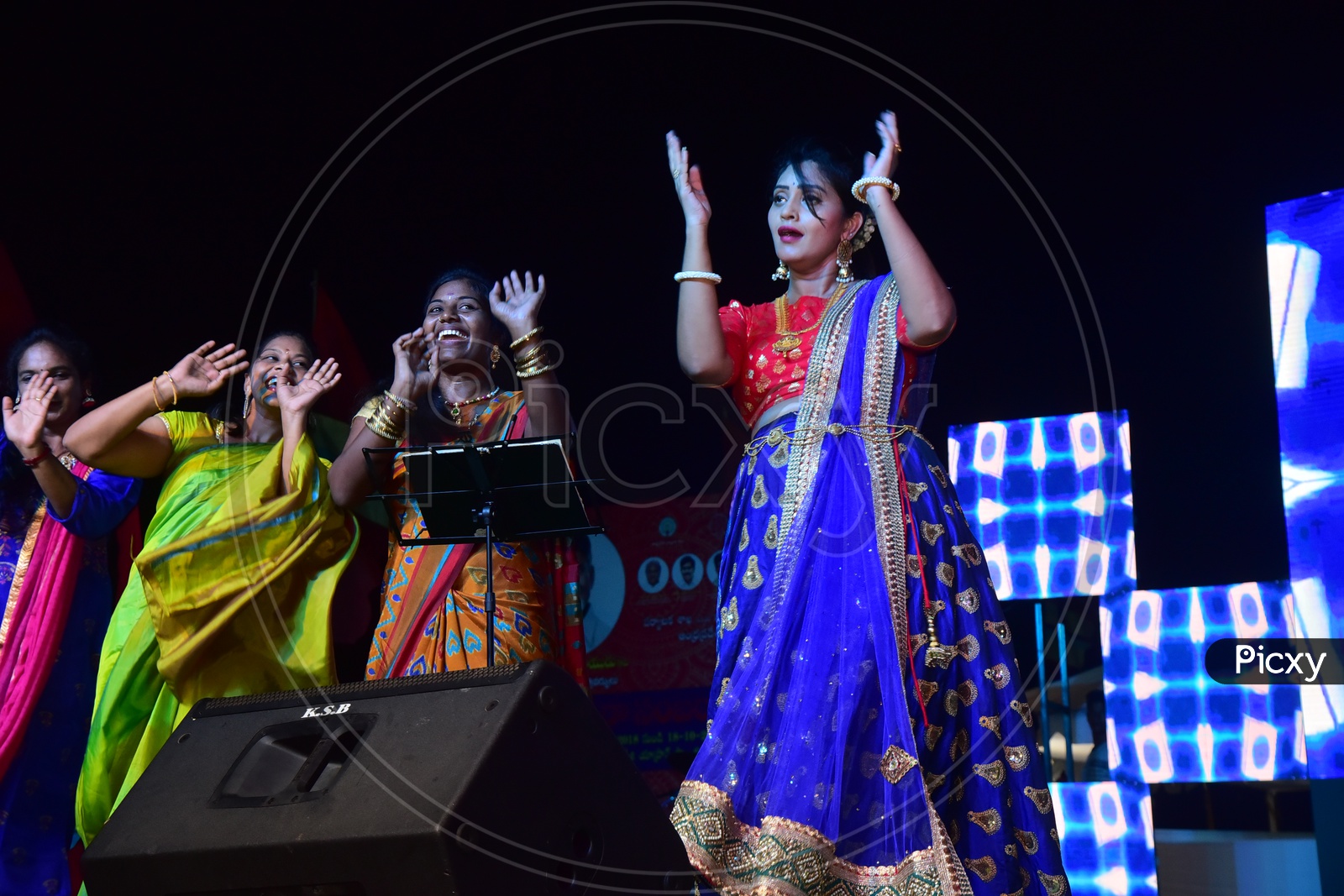 Ladies Dancing On Stage in an event