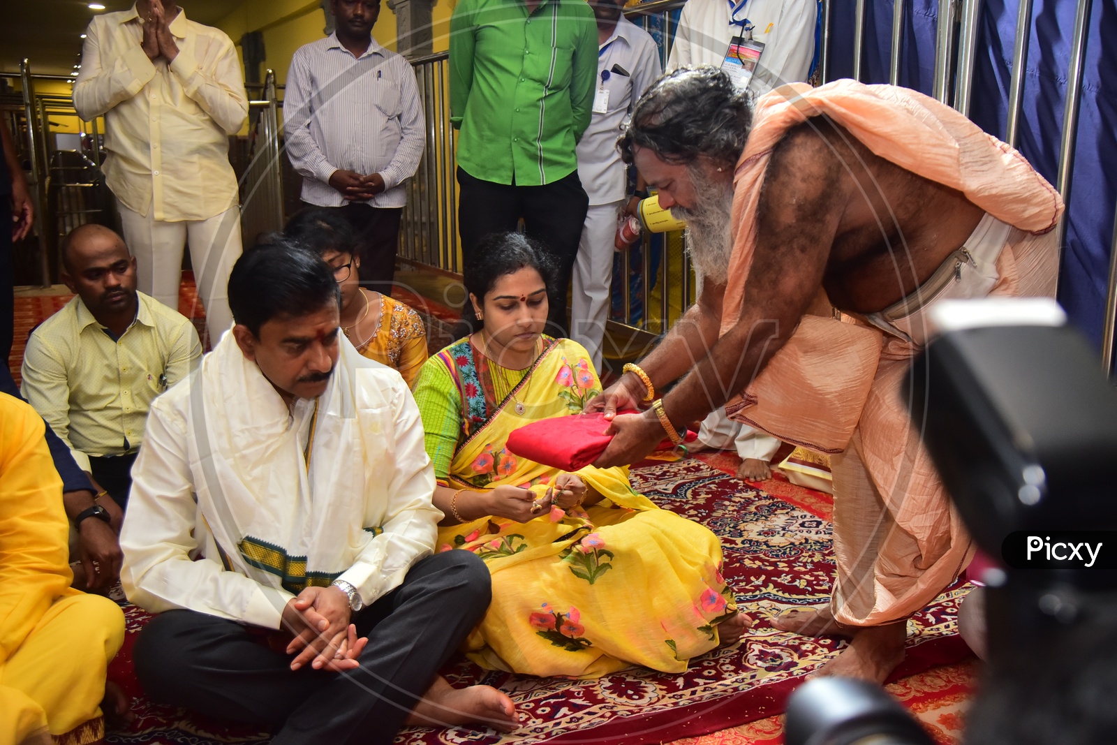 Devineni Uma At Kanaka durga Temple along With His Daughter