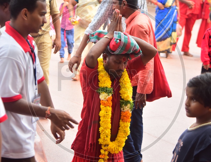 Devotees Carrying Mudupulu By wearing Bhavani Mala