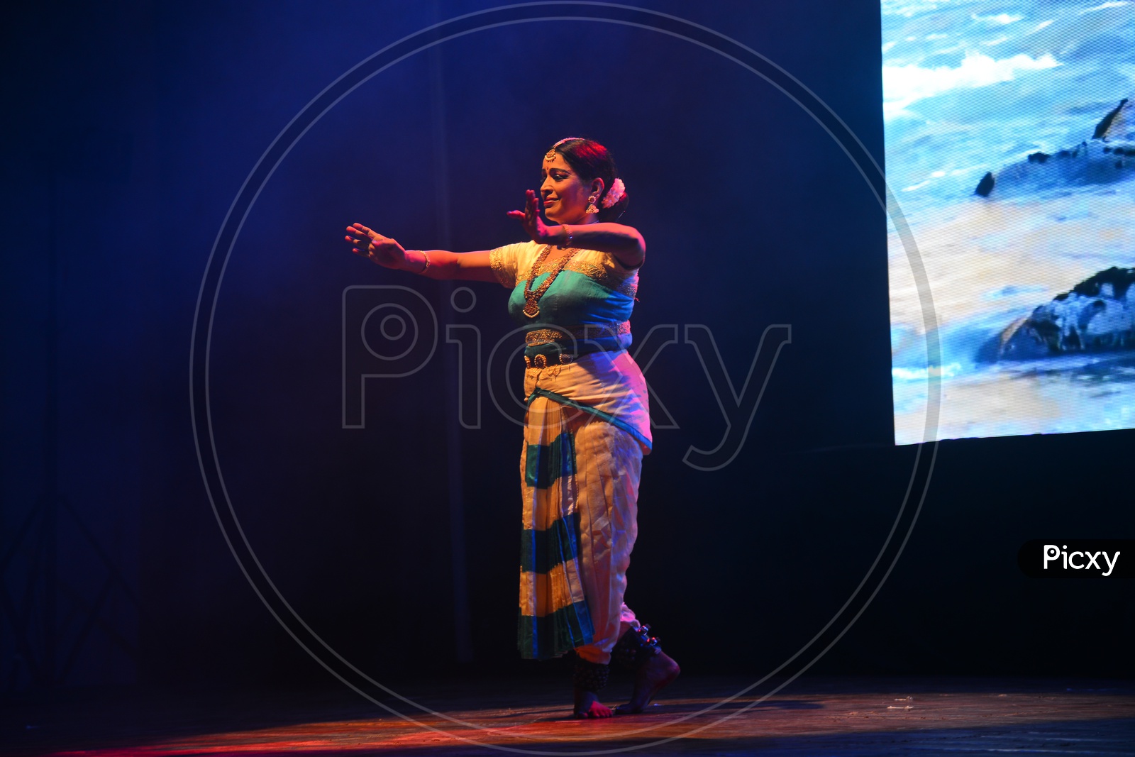 Bharathanatyam , A Classical Dance Art Form Performing On Stage By an Artist
