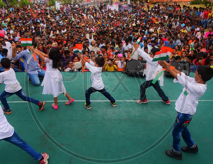 School Children Dancing On Stage