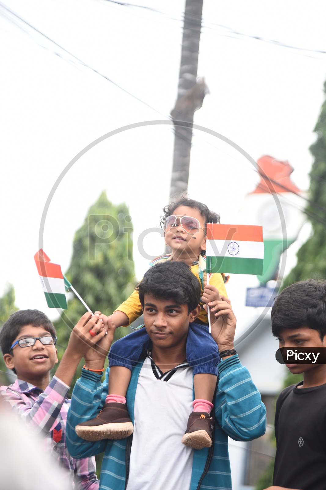 Young School Kid With Indian National Flag