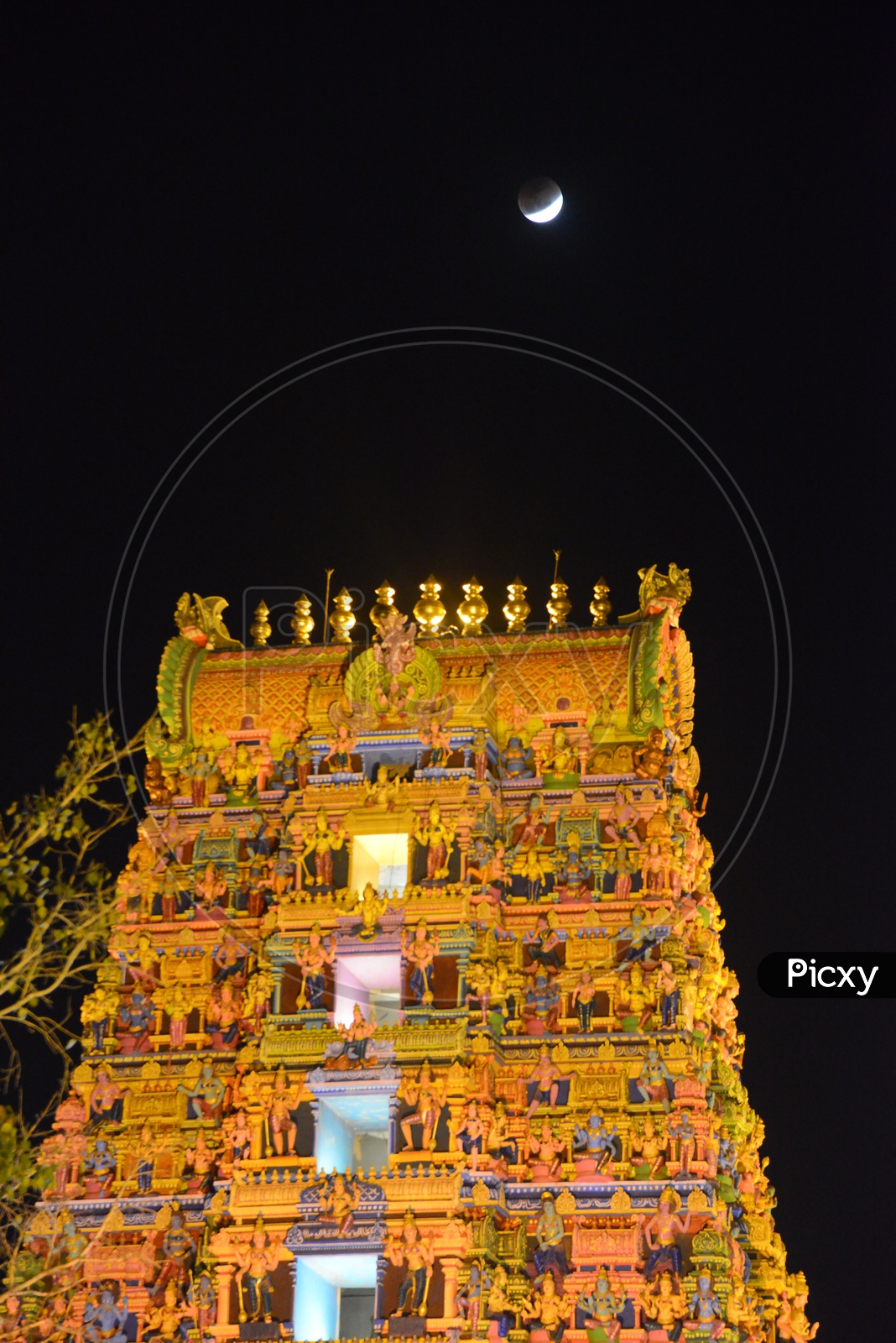 Moon Lunar Eclipse Over Hindu  Temple Shrine