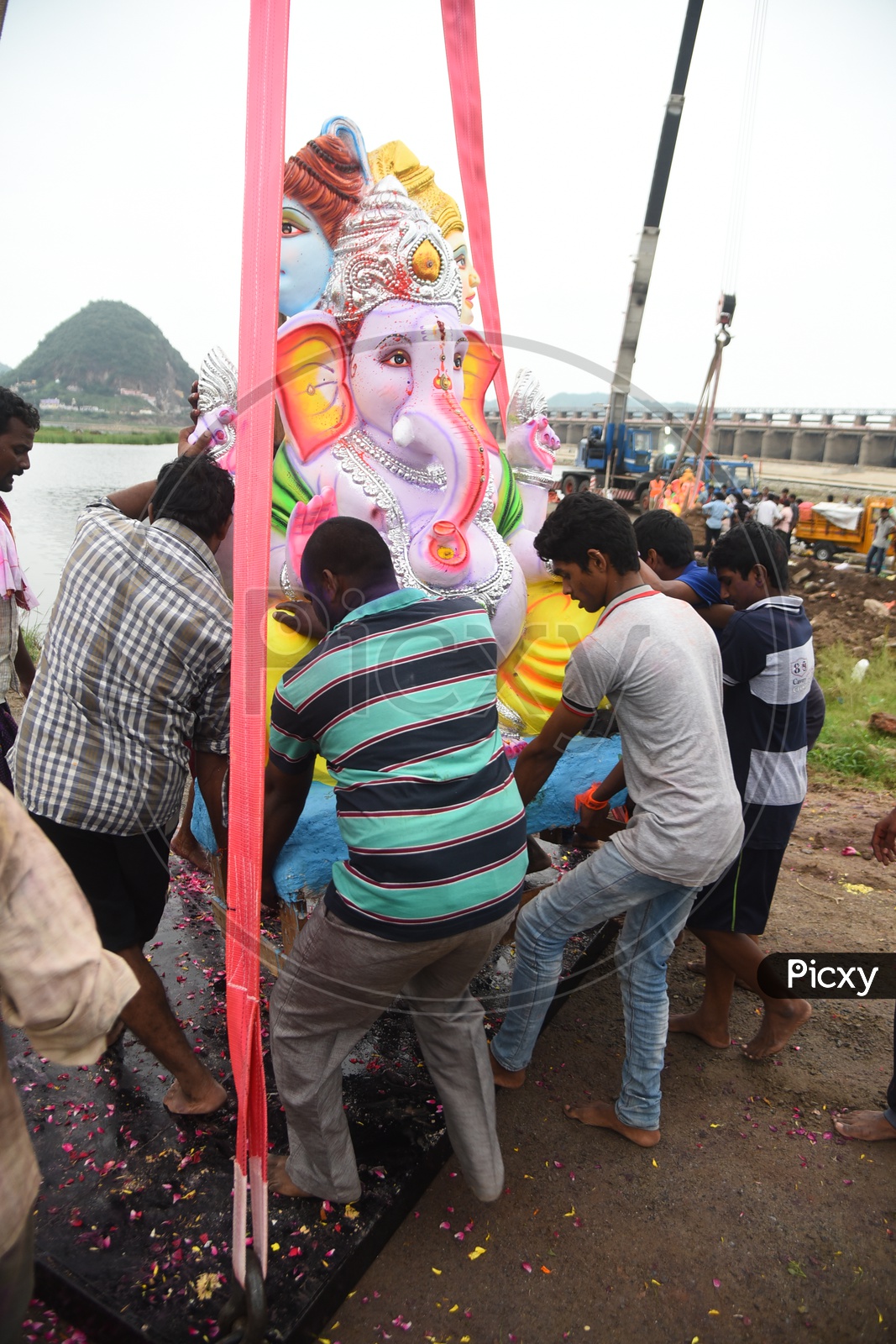 Locals Immersing Ganesh idol