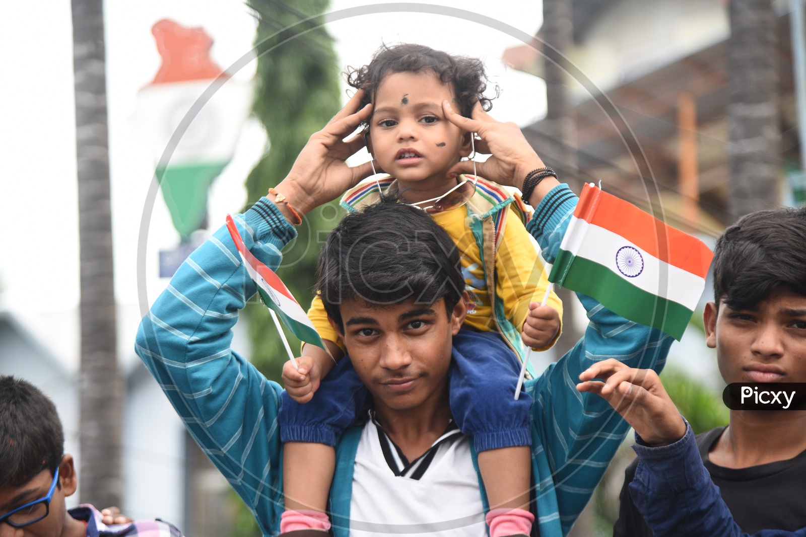 Young Kid Holding Indian National Flag