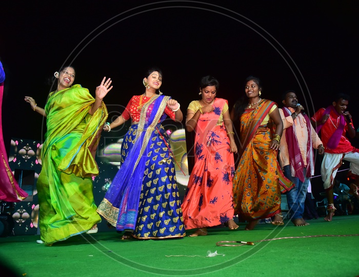 Ladies Dancing On stage in an Event