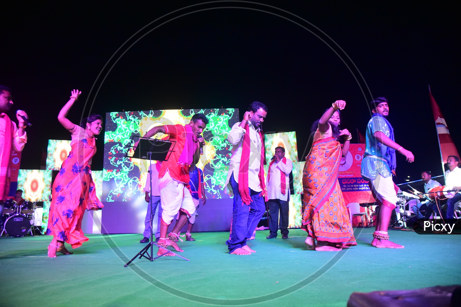Traditional Folk Dancers Dancing On Stage