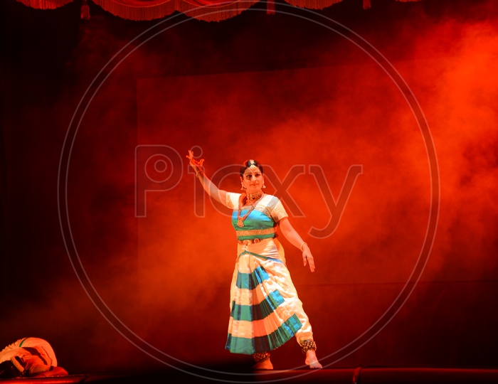 Bharatanatyam , A Classical Dance Art Form Performing on Stage By an Artist