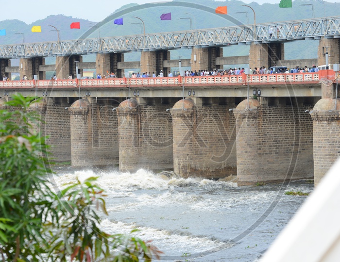 People and traffic on Praksam barrage over Krishna river in Vijayawada