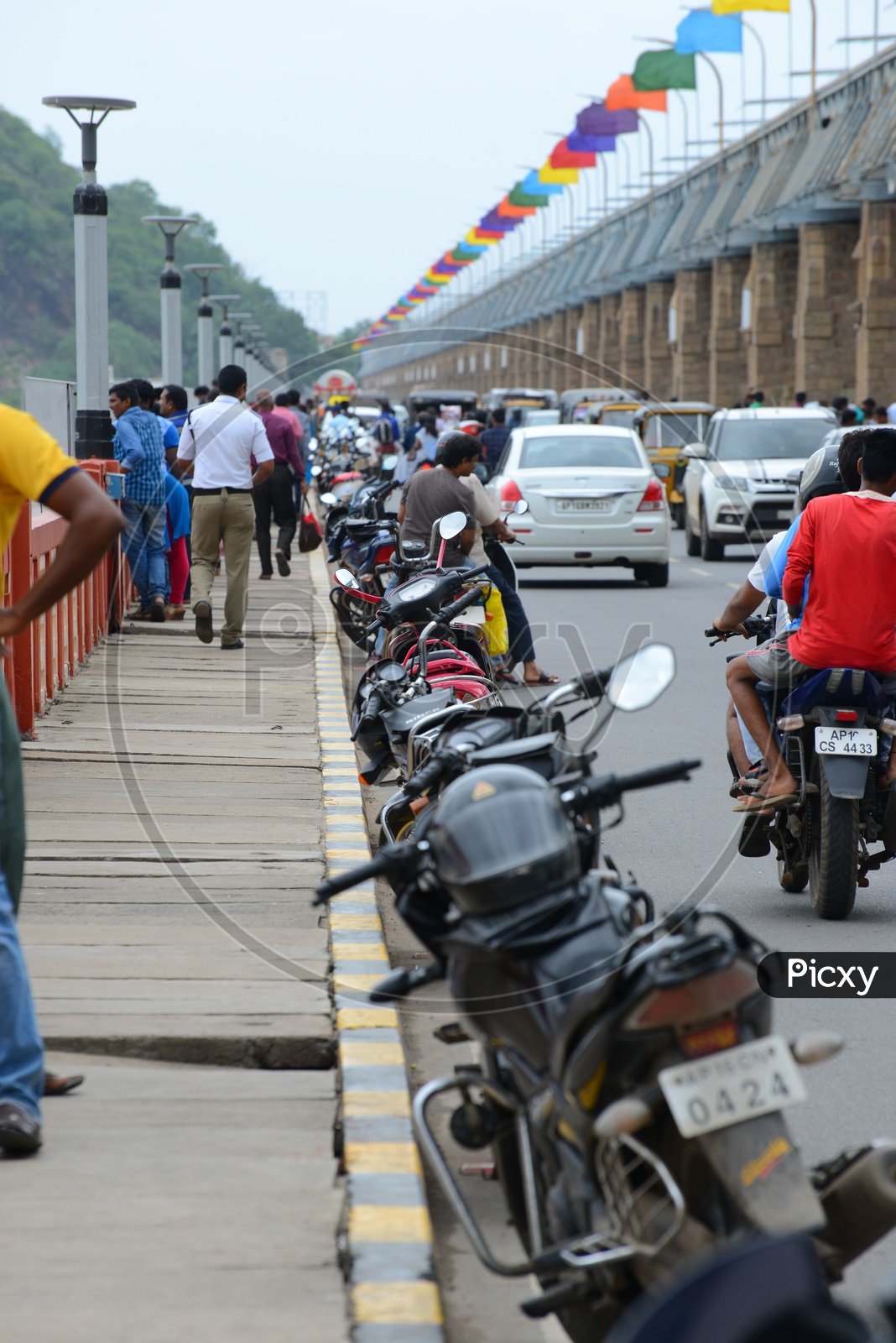 Parked bikes on Prakasam barrage over Krishna river in Vijayawada