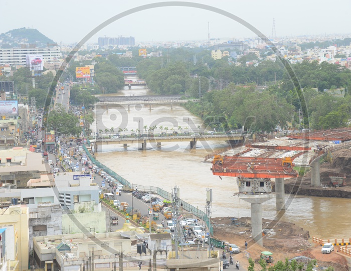 Ariel view of the construction bridge over Krishna river and traffic in Vijayawada