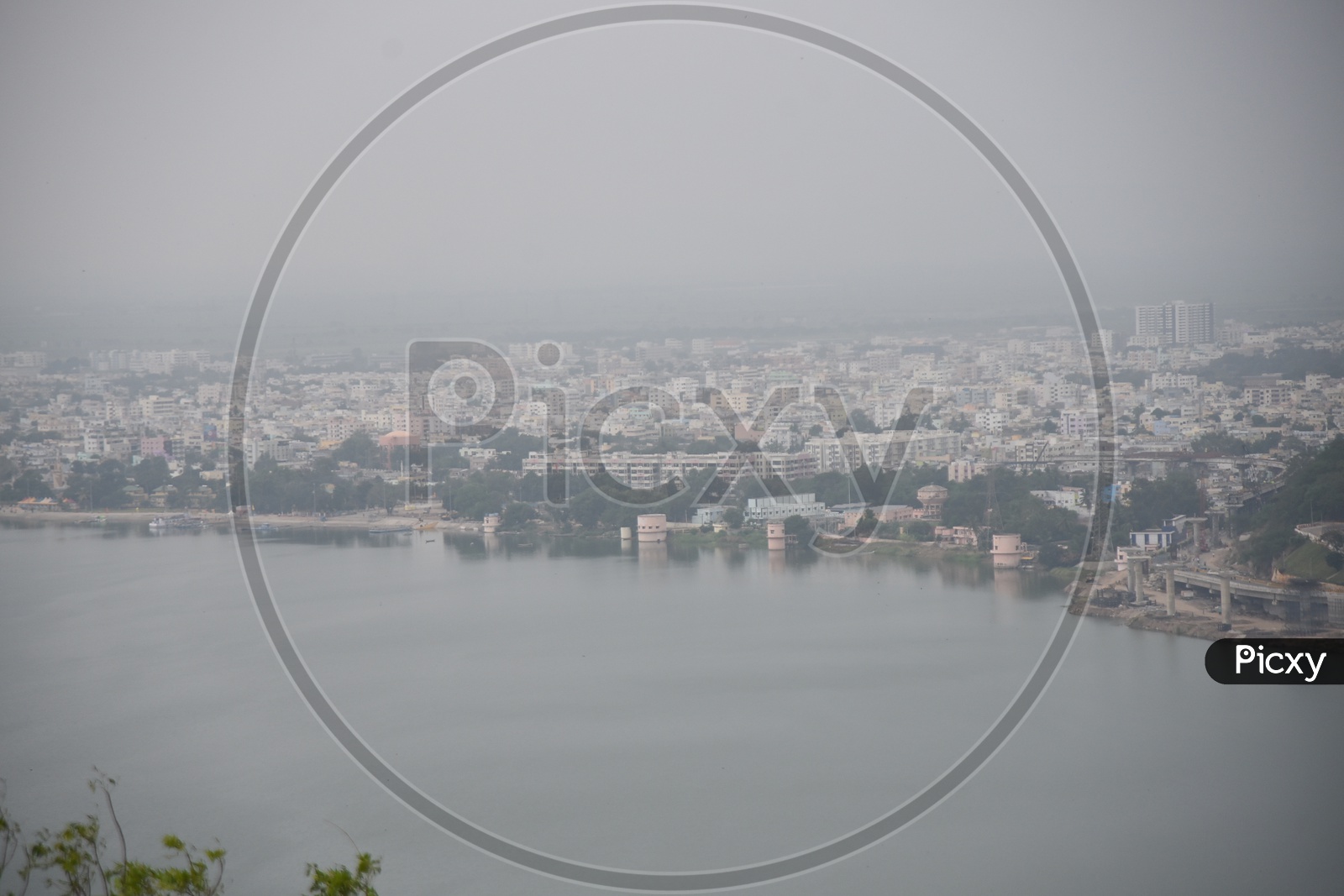 Aerial view of krishna river flowing beside the city