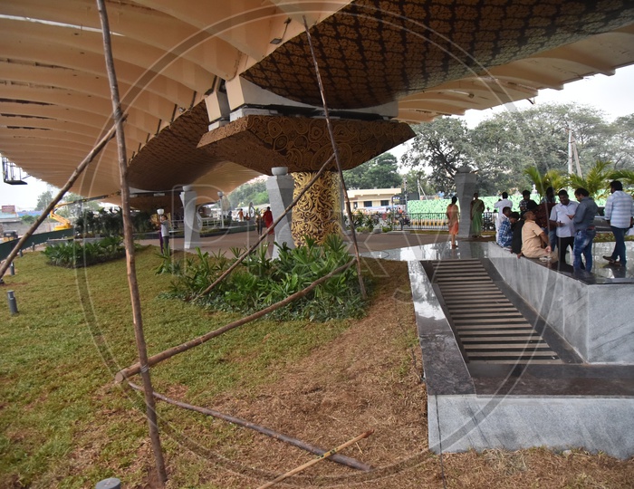 Locals Sitting and Chatting Under Flyover