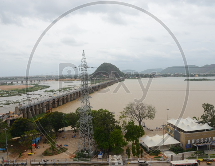 Ariel view of the praksam barrage over Krishna river and traffic in Vijayawada