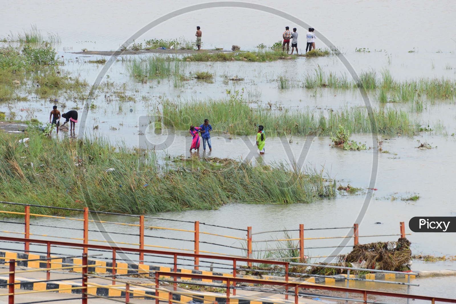 People at the river bank of Krishna river
