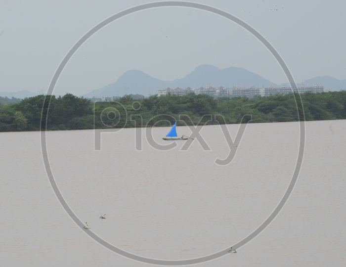 Boat in the middle of the Krishna River
