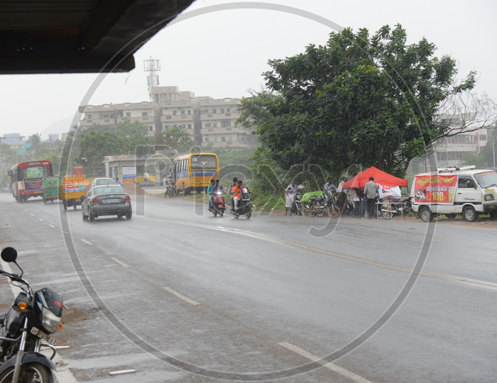 Vehicles on road during rain