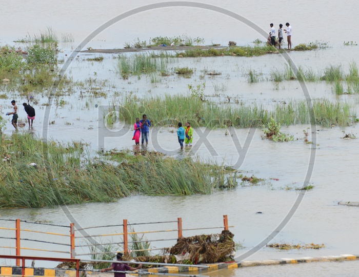 People at the river bank of  Krishna river