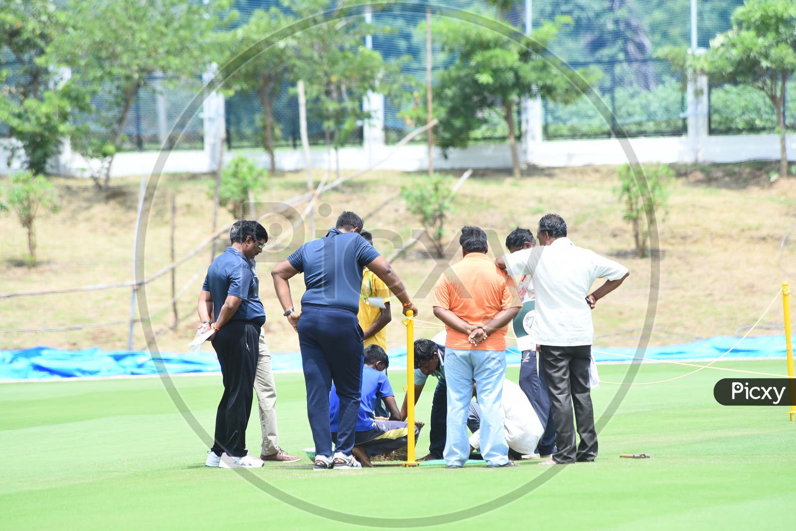 Cricket pitch checking by the authorities