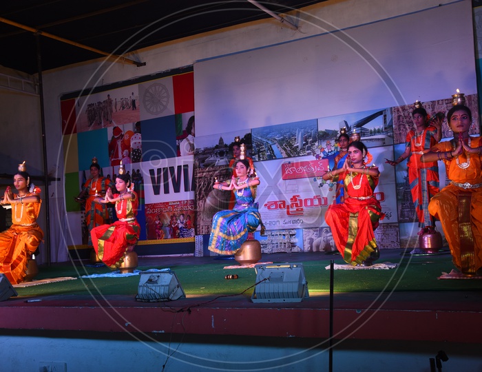 Bharratanatyam Dancers Performing On Stage