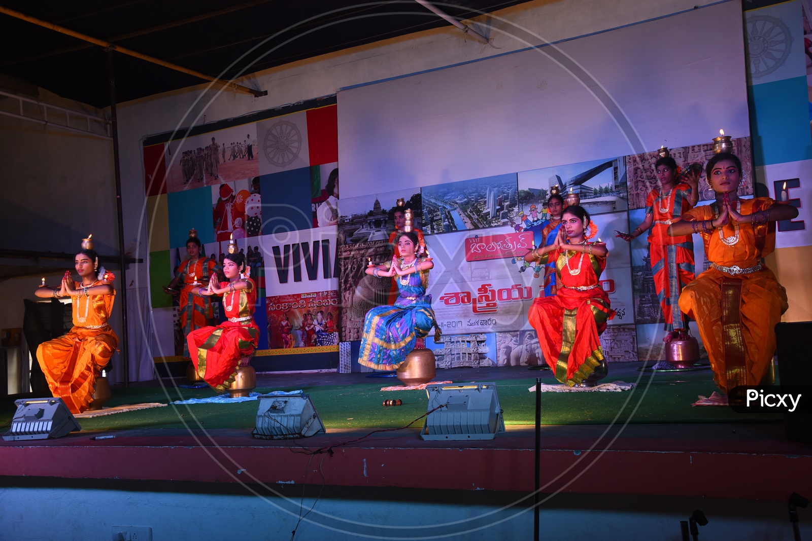 Bharratanatyam Dancers Performing On Stage