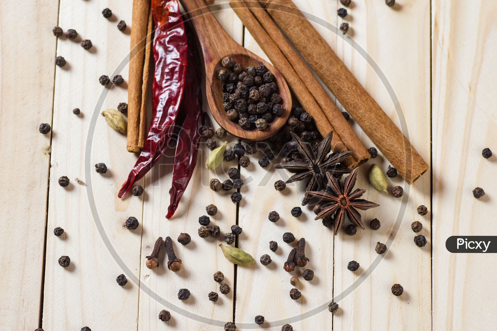 Cinnamon stick, Dried Red Chili, Star Anise, Cloves, Elachi, Black Pepper